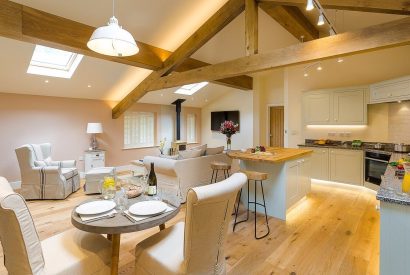 The open plan kitchen, living and dining room at Twitchers Cottage, Lake District