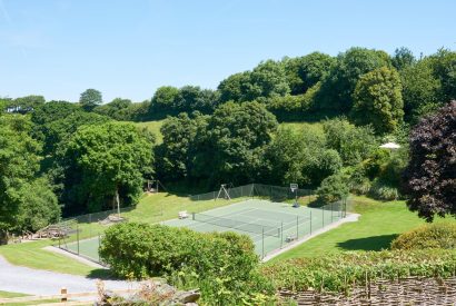 The tennis court at Buckfast Cottage, Devon