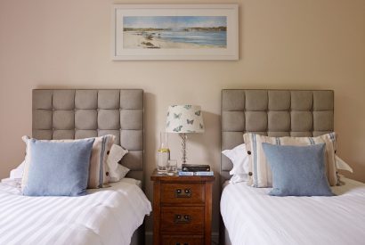 A twin bedroom at Georgian House, Devon