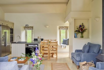 The living room and kitchen at Harberton Cottage, Devon