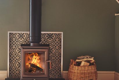 The wood-burning stove in the living room at Hay Bale Cottage, Worcestershire