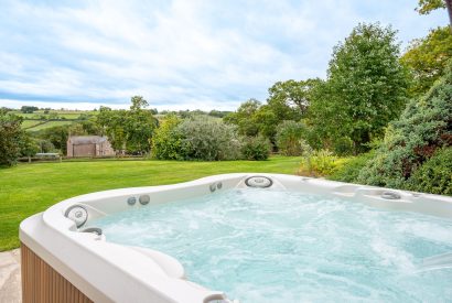 The hot tub with views of the countryside at Tinkers Folly, Yorkshire
