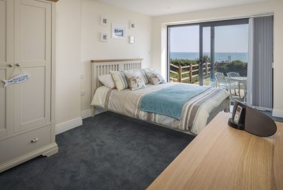 A double bedroom with sea view at Beesands Vista, Devon