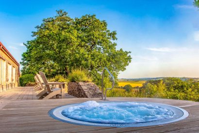 The hot tub overlooking the countryside at Dart Cottage, Devon