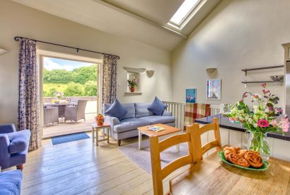 The open-plan kitchen, dining and living room at Harberton Cottage, Devon