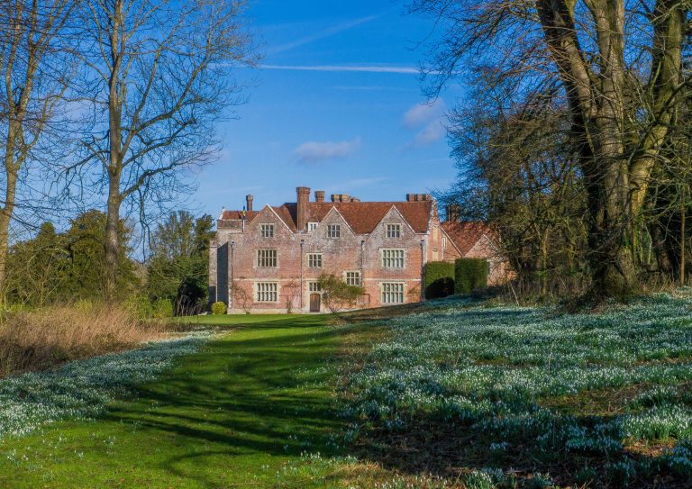 Jane Austen's Chawton House, with snowdrops in the foreground