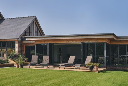 The swimming pool and sun loungers at Big Barn, Welsh Borders