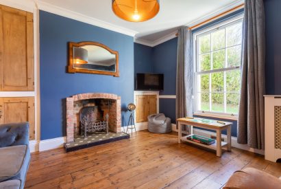 The living room and fire place at Millook View Farmhouse, Cornwall