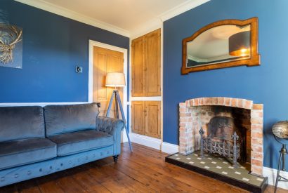 The living room at fire place at Millook View Farmhouse, Cornwall
