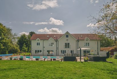 The garden and swimming pool at Sharnbrook Retreat, Bedfordshire