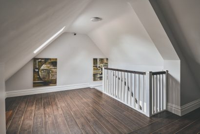 A landing leading to a double bedroom at Sharnbrook Retreat, Bedfordshire