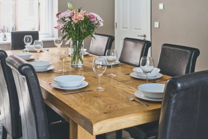 The eight-seater dining table at Sharnbrook Retreat, Bedfordshire