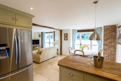 The open plan kitchen and dining room at Brightwaters Stables, Hampshire