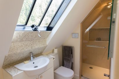 An bathroom with a walk-in shower at Brightwaters Stables, Hampshire