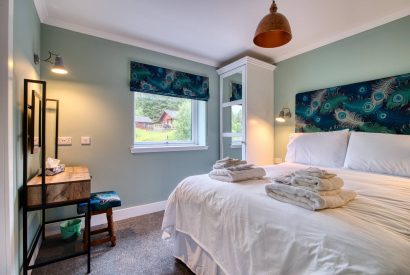 A double bedroom at Pine Cabin, Loch Lomond