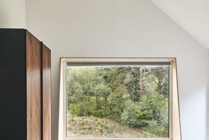 A bedroom view at Stag Cabin, Loch Lomond