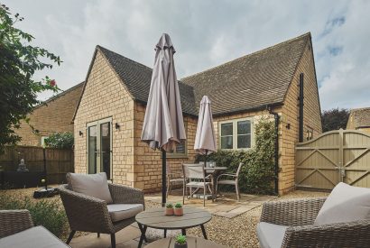 The courtyard and exterior of Bay Tree Cottage, Cotswolds