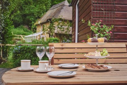 The outdoor dining table at The Round, Devon