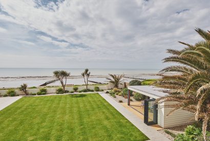 The garden with sea view at Beach Manor, West Sussex