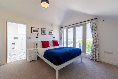 A double bedroom with an ensuite at Minack View, Cornwall