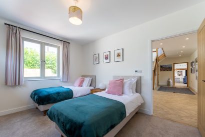 A twin bedroom on the ground floor of Minack View, Cornwall