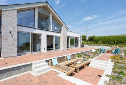 The back exterior and landscaped patio at Minack View, Cornwall