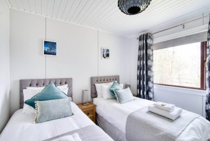 A twin bedroom at Ben More Cabin, Loch Lomond