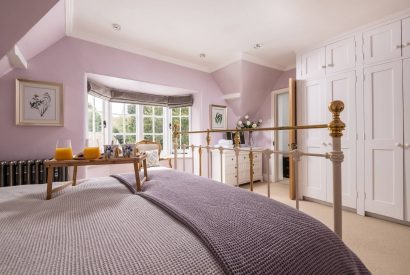A bedroom with a breakfast tray at Rose Cottage, Isle of Wight
