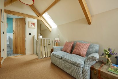 The sitting area in the bedroom at Haymaker Barn, Cotswolds