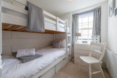 A bedroom with bunk beds at Cawsand Coastal Retreat, Cornwall
