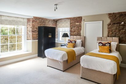 A twin bedroom at Scott's Manor, Somerset
