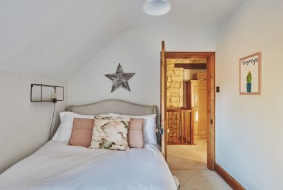 A bedroom at Ember Cottage, Cotswolds