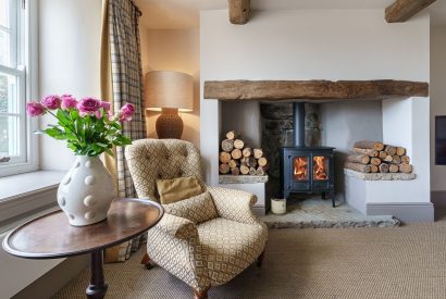 The living room with a log burner at Pen y Bryn, Abersoch