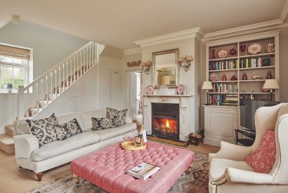The living room with log burner at Hardy Cottage, Cotswolds