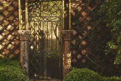 A garden gate at Tennyson House, Cotswolds