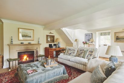 The living room with log burner at Blake Cottage, Cotswolds