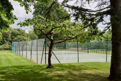 The tennis courts at Country Manor, Oxfordshire