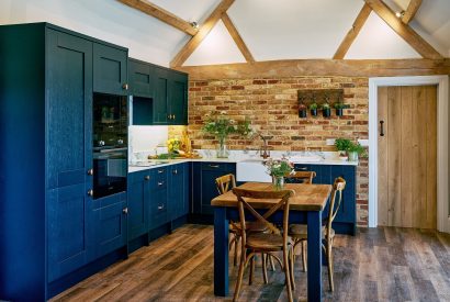 The kitchen and dining table in Stable Barn, Cotswolds
