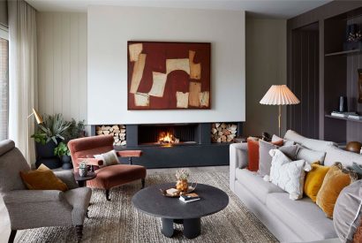The living room with fire place at The Reserve, Cotswolds