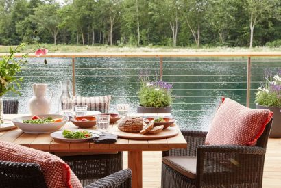 The balcony with lake view at Alder Grand Suite, Cotswolds