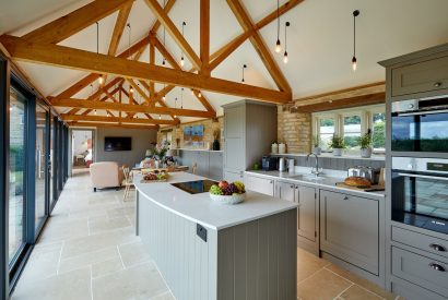 The open-plan kitchen and living space at Milk Barn, Cotswolds