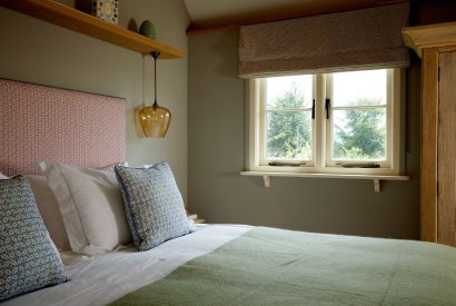 A double bedroom at Milk Barn, Cotswolds