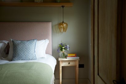 A double bed at Milk Barn, Cotswolds