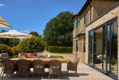 The outdoor dining area at Lakeside Manor, Cotswolds
