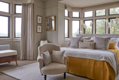 The master bedroom at Lakeside Manor, Cotswolds