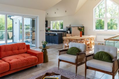 The open plan living space at Lakefront Lodge, Cotswolds