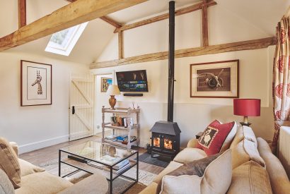 The living room with log burner at Jersey Barn, Chiltern Hills
