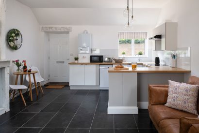 The open-plan kitchen, dining and living space at Little Calf Cottage, Wiltshire
