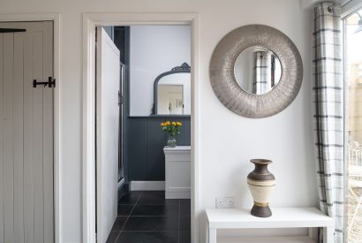 The hallway leading to a bathroom at Little Calf Cottage, Wiltshire
