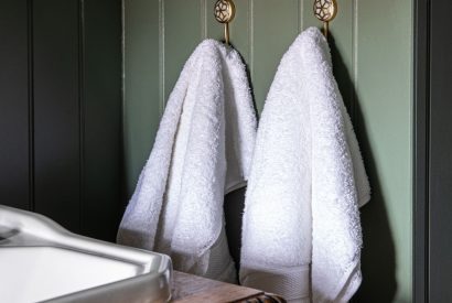 Towels hanging in the bathroom at The Townhouse Sherborne, Dorset